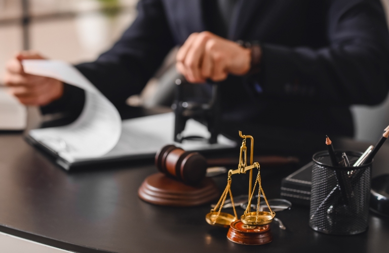 Lawyer is putting stamp on the document